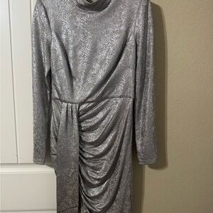 Only wore once. This elegant dresss is gorgeous.